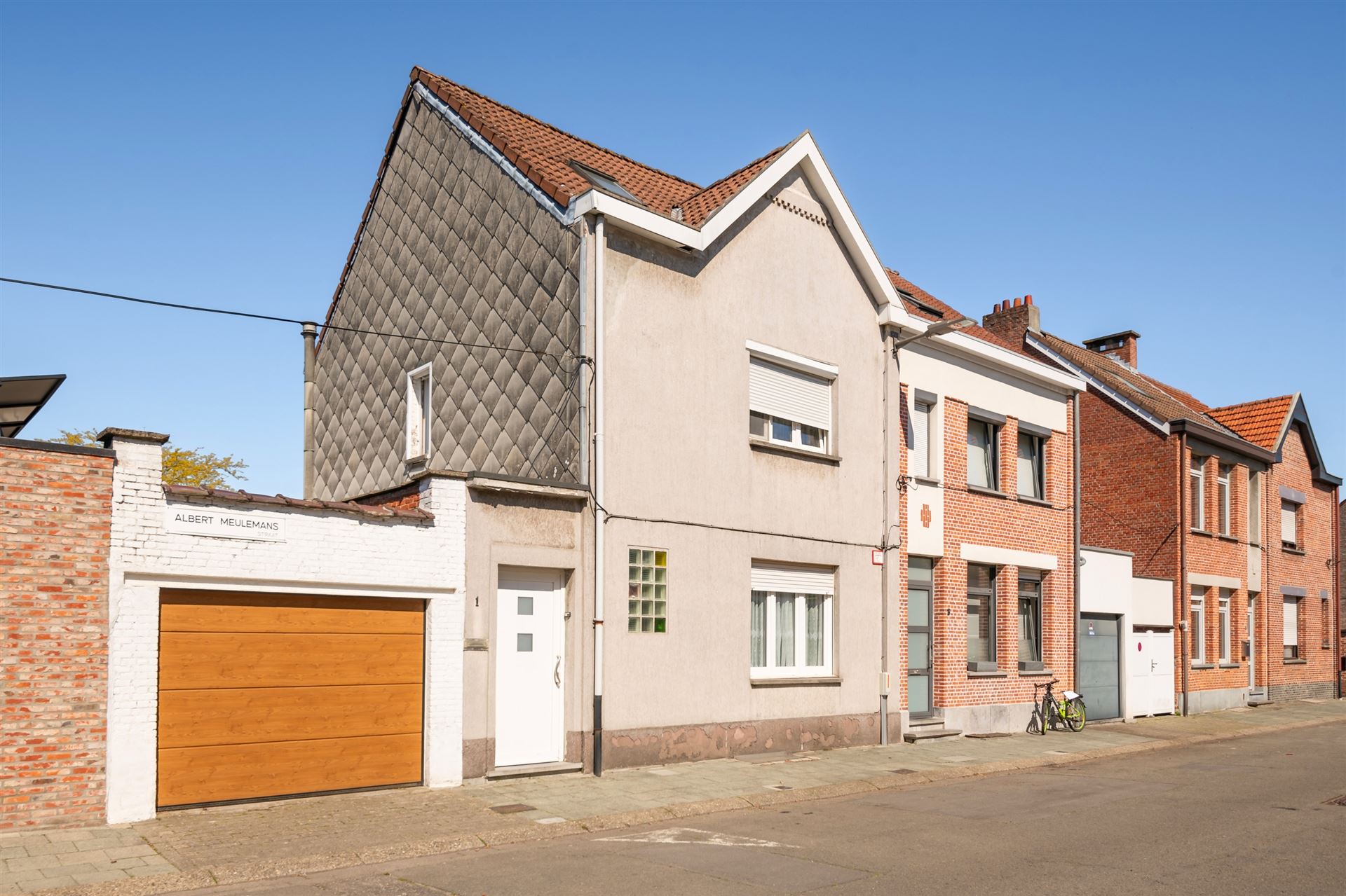 Centraal gelegen gezinswoning met 3 slaapkamers en stadstuin.