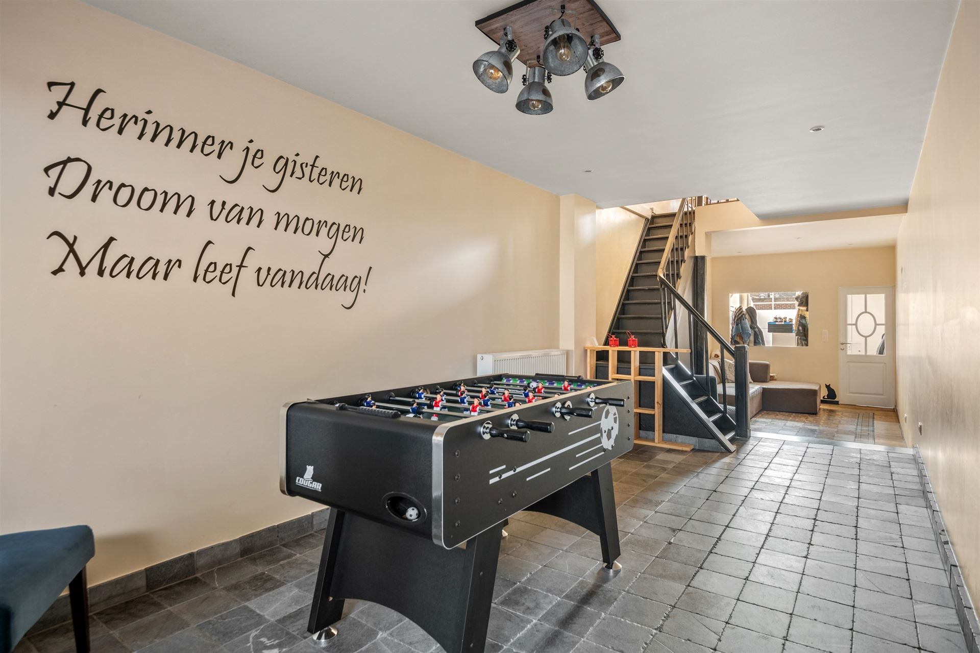 Centraal gelegen gezinswoning met zonnige tuin.