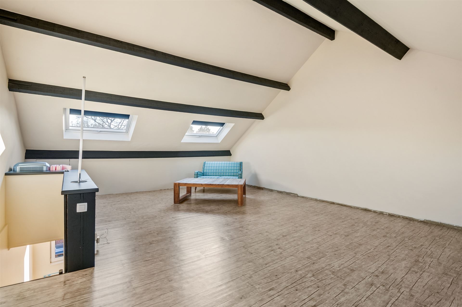Centraal gelegen gezinswoning met zonnige tuin.
