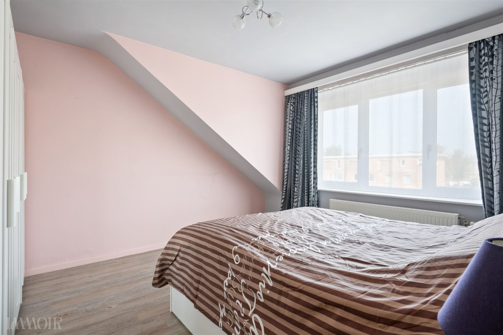 Charmante bel-etage met tuin en oprit nabij centrum Aartselaar.