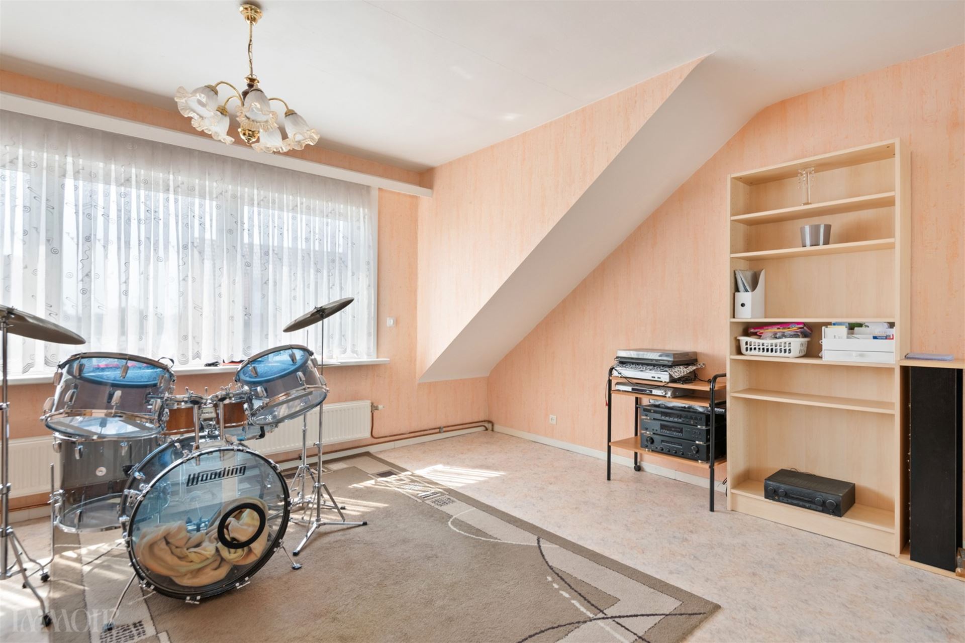 Charmante bel-etage met tuin en oprit nabij centrum Aartselaar.