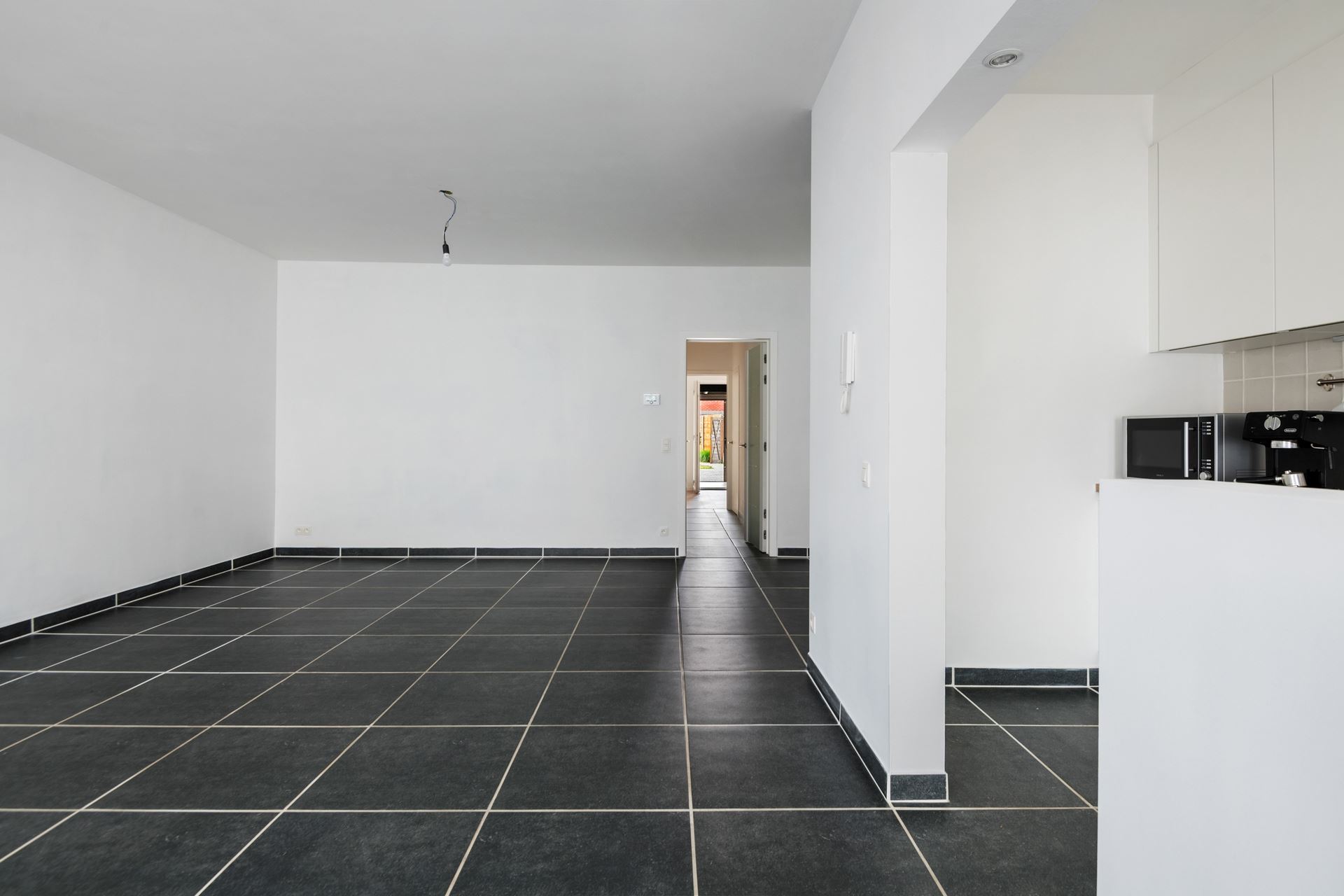 Modern en ruim gelijkvloers appartement in Schoten.
