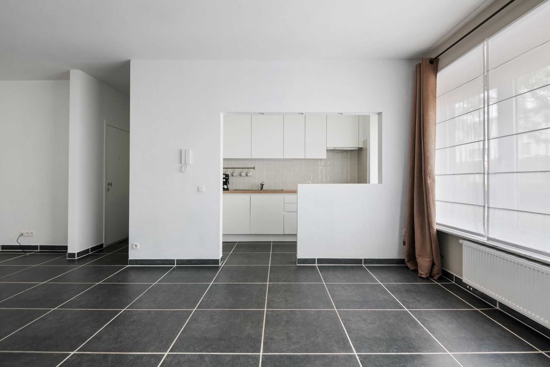 Modern en ruim gelijkvloers appartement in Schoten.