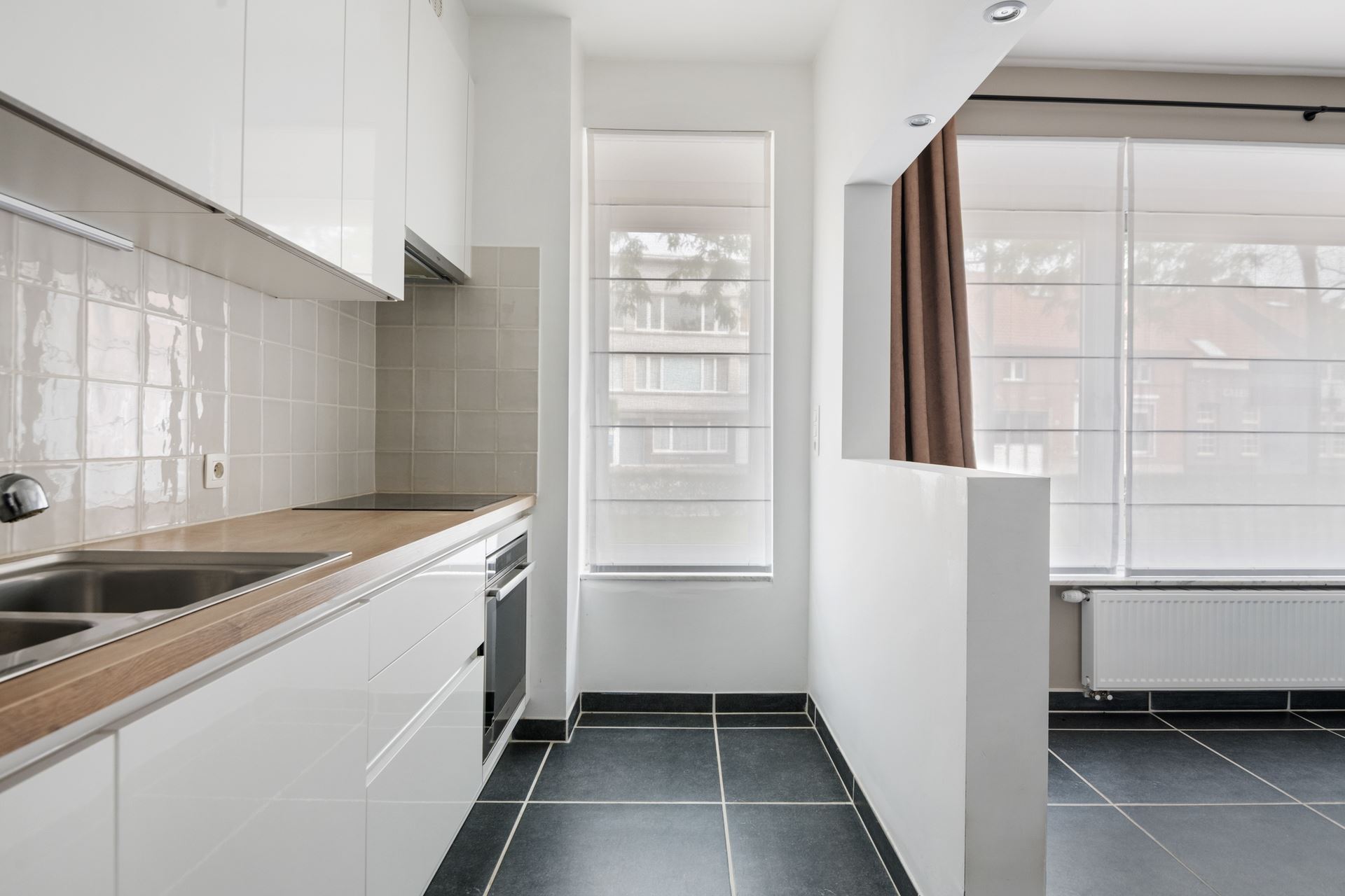 Modern en ruim gelijkvloers appartement in Schoten.