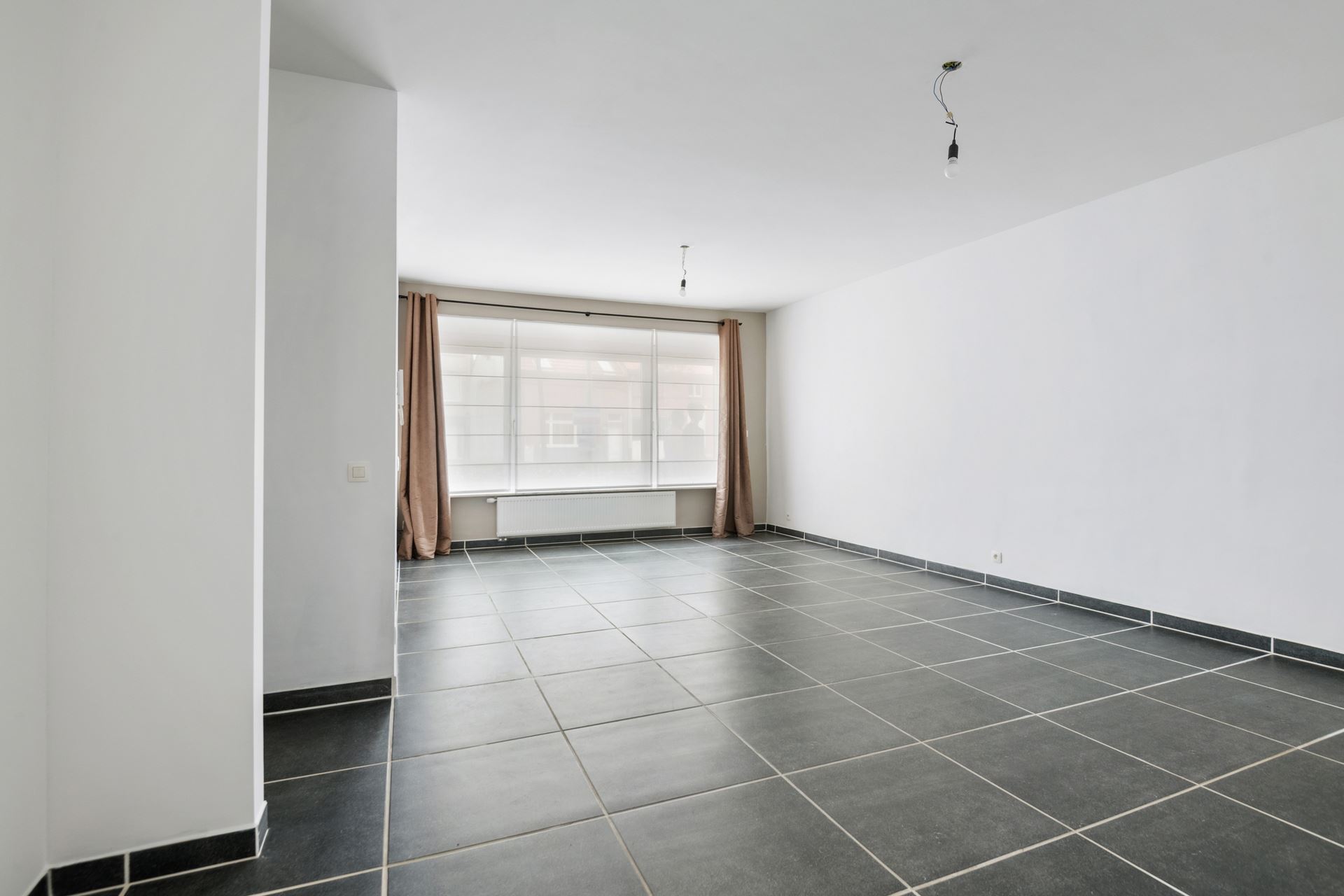 Modern en ruim gelijkvloers appartement in Schoten.