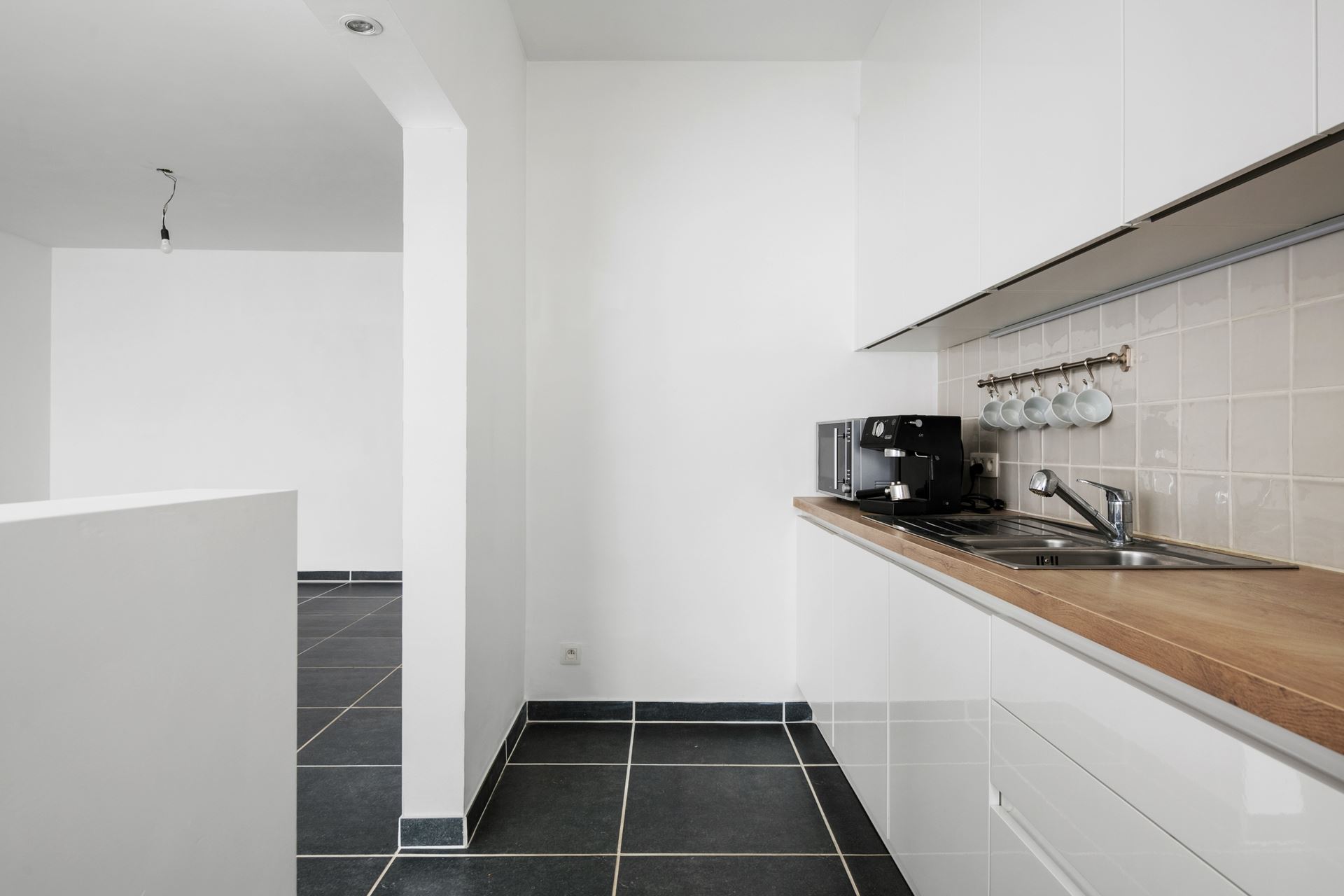 Modern en ruim gelijkvloers appartement in Schoten.