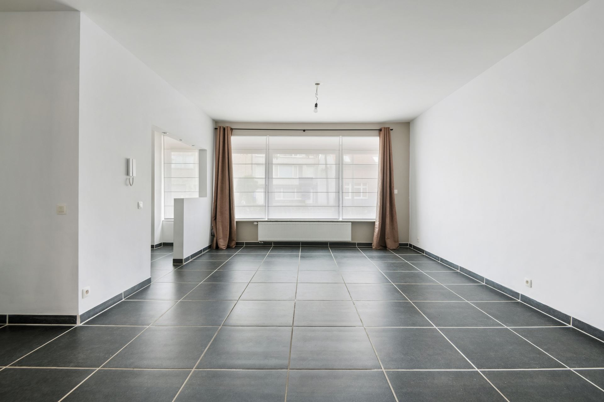 Modern en ruim gelijkvloers appartement in Schoten.