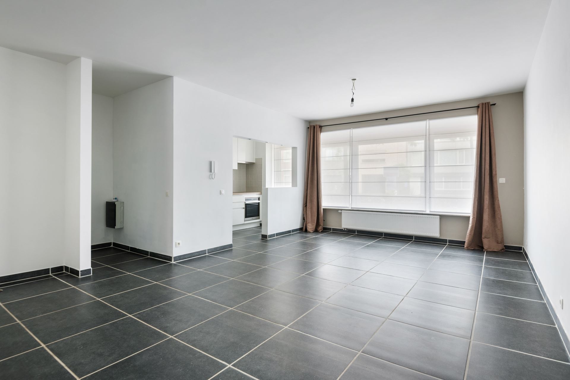 Modern en ruim gelijkvloers appartement in Schoten.