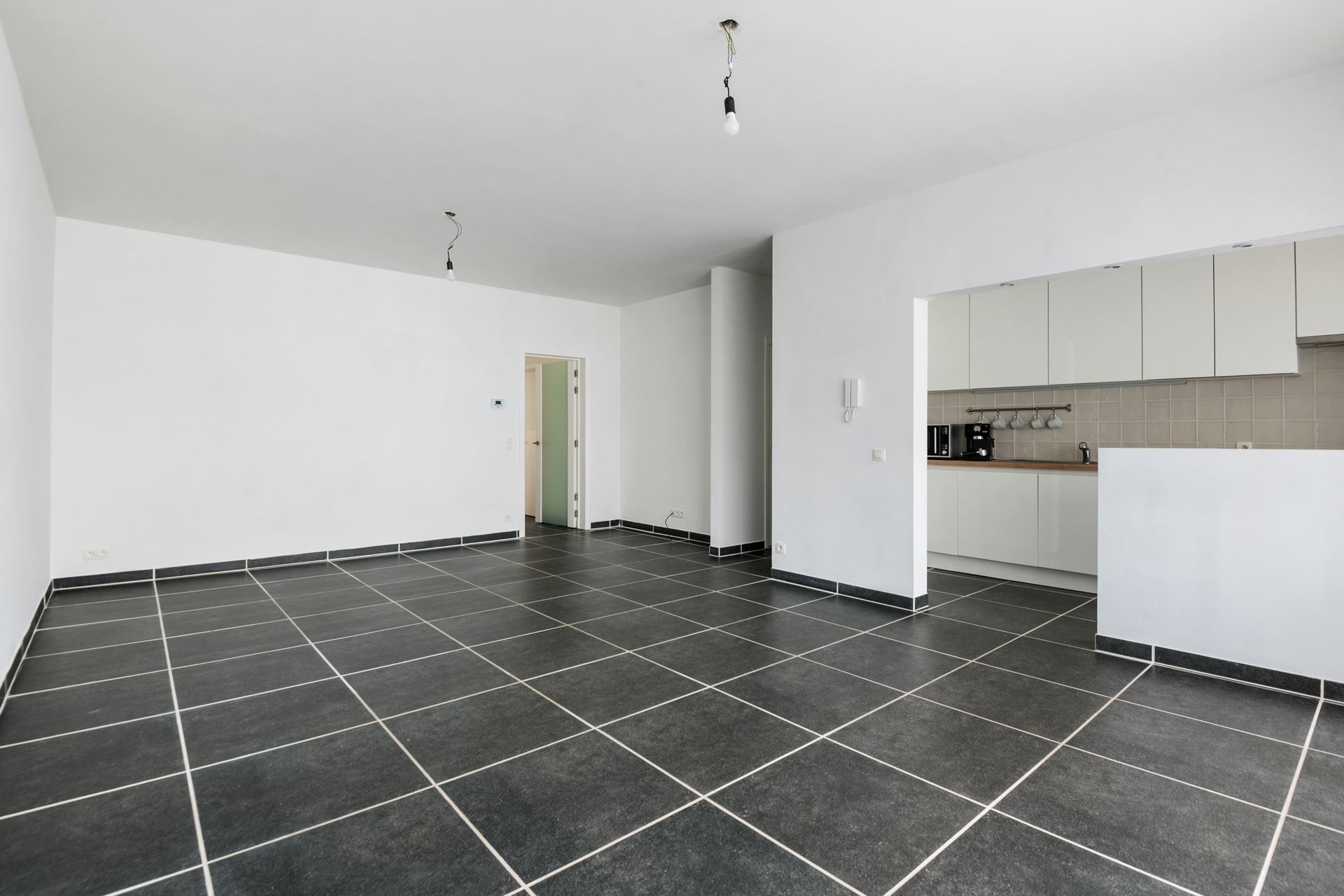 Modern en ruim gelijkvloers appartement in Schoten.