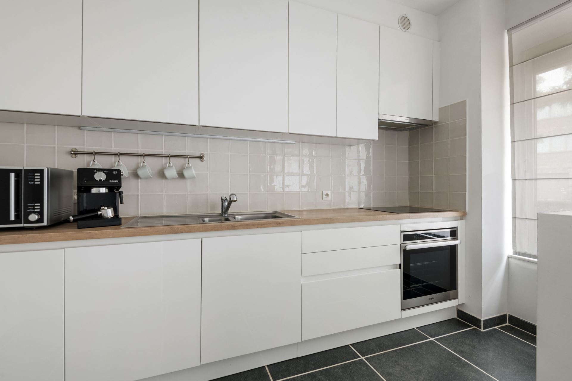 Modern en ruim gelijkvloers appartement in Schoten.