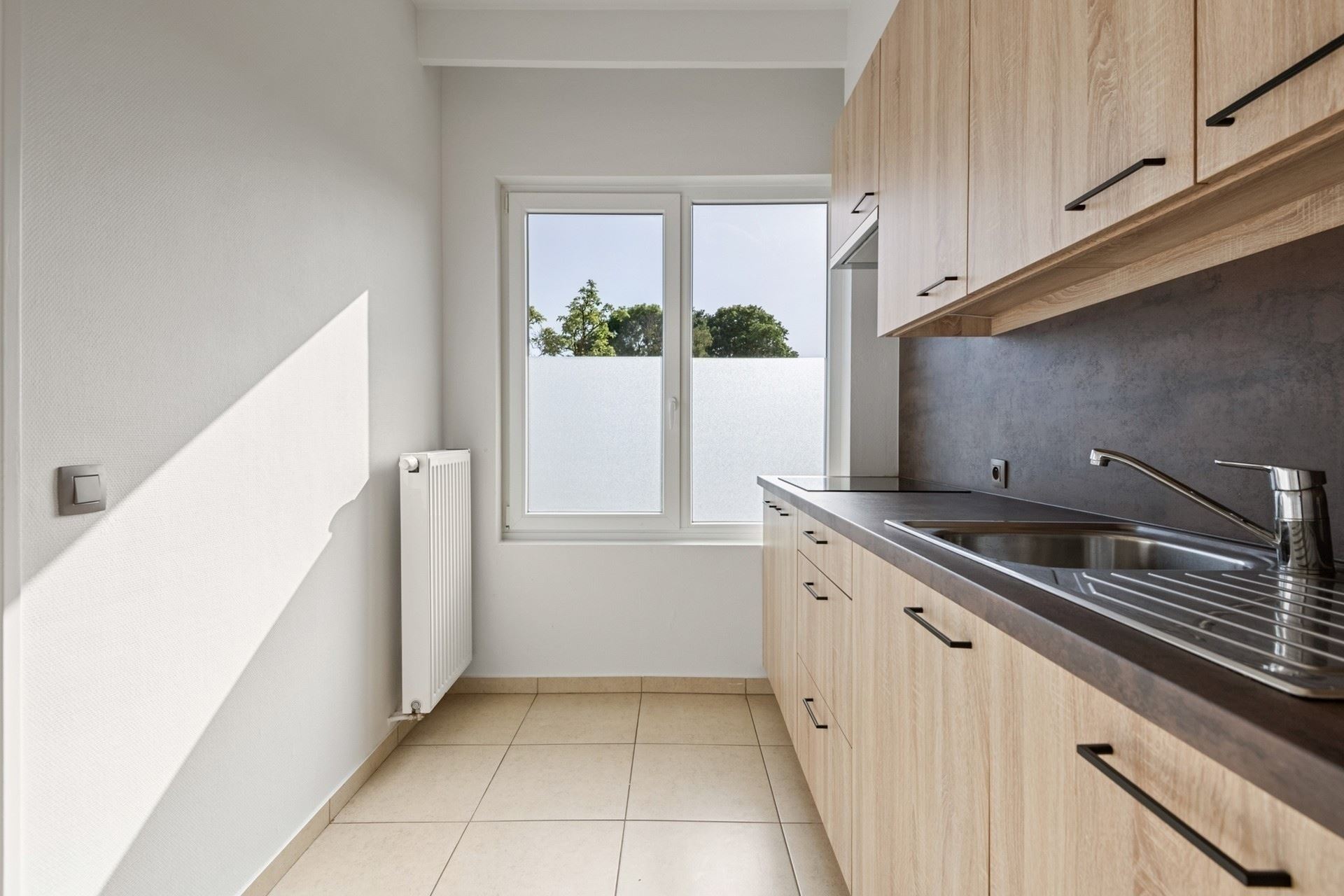 Centraal gelegen en instapklaar appartement met garagebox. 