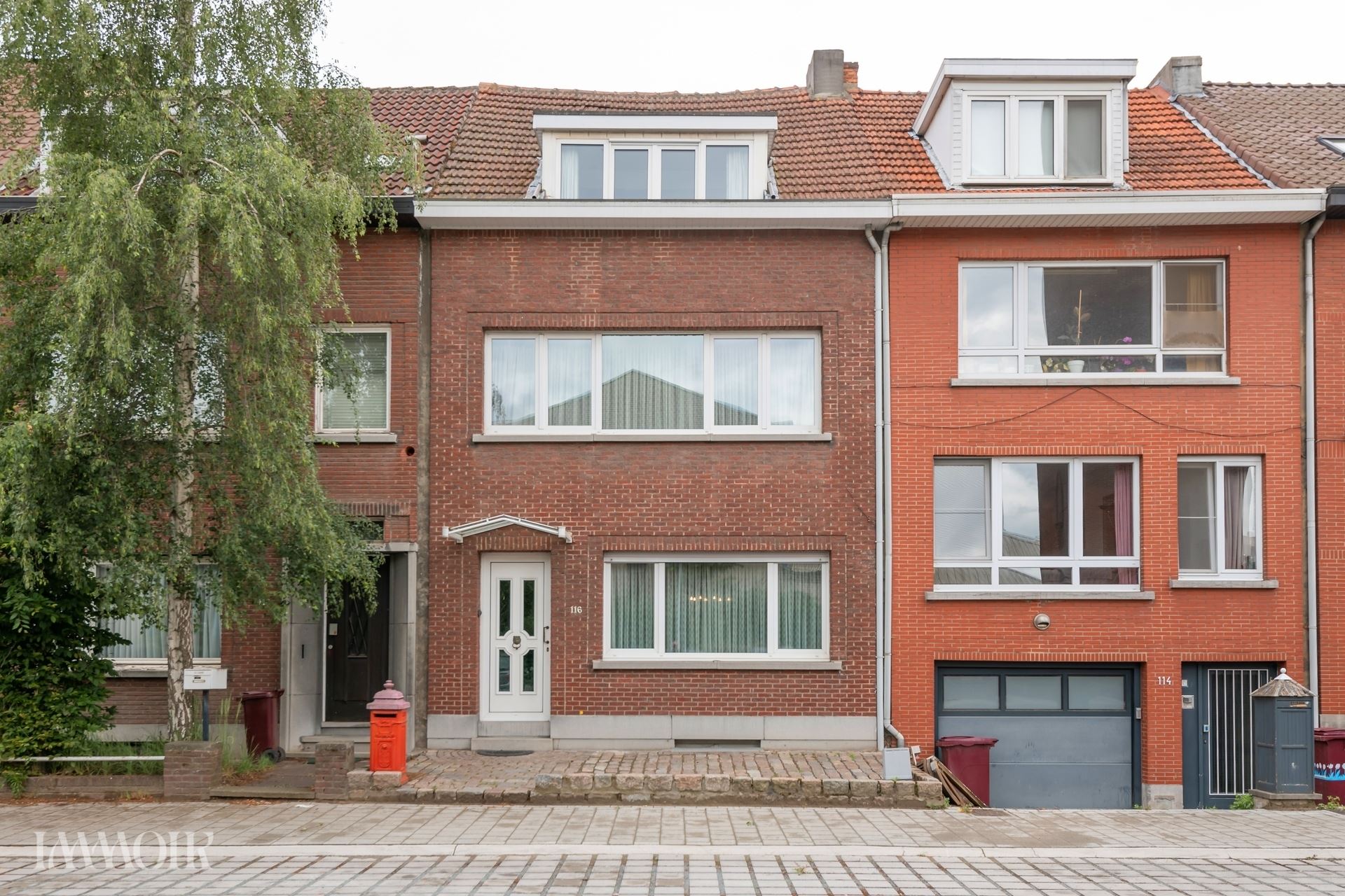 Ruime woning met stadstuin en tal van mogelijkheden op centrale ligging.