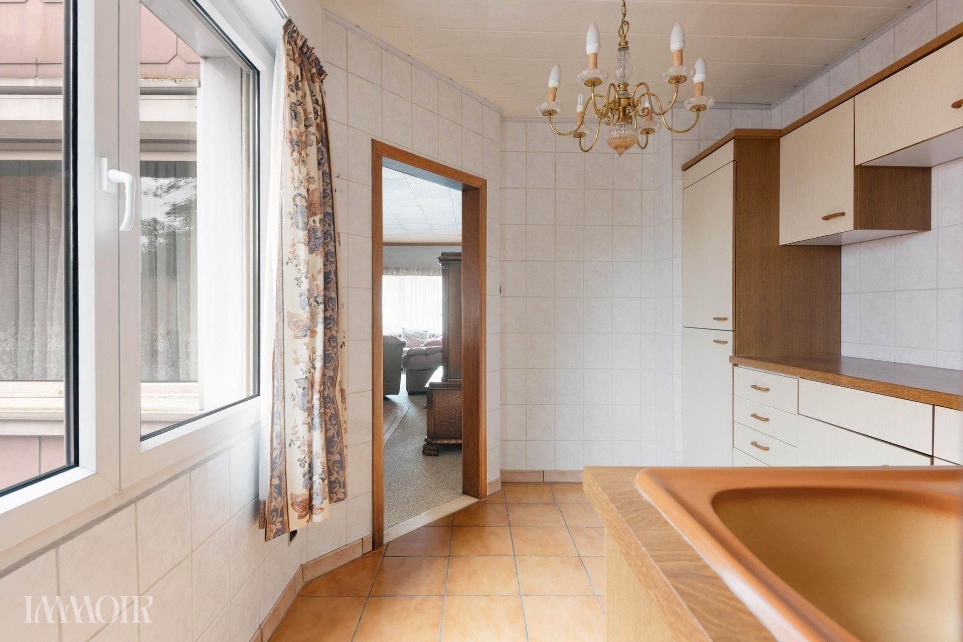 Ruime woning met stadstuin en tal van mogelijkheden op centrale ligging.