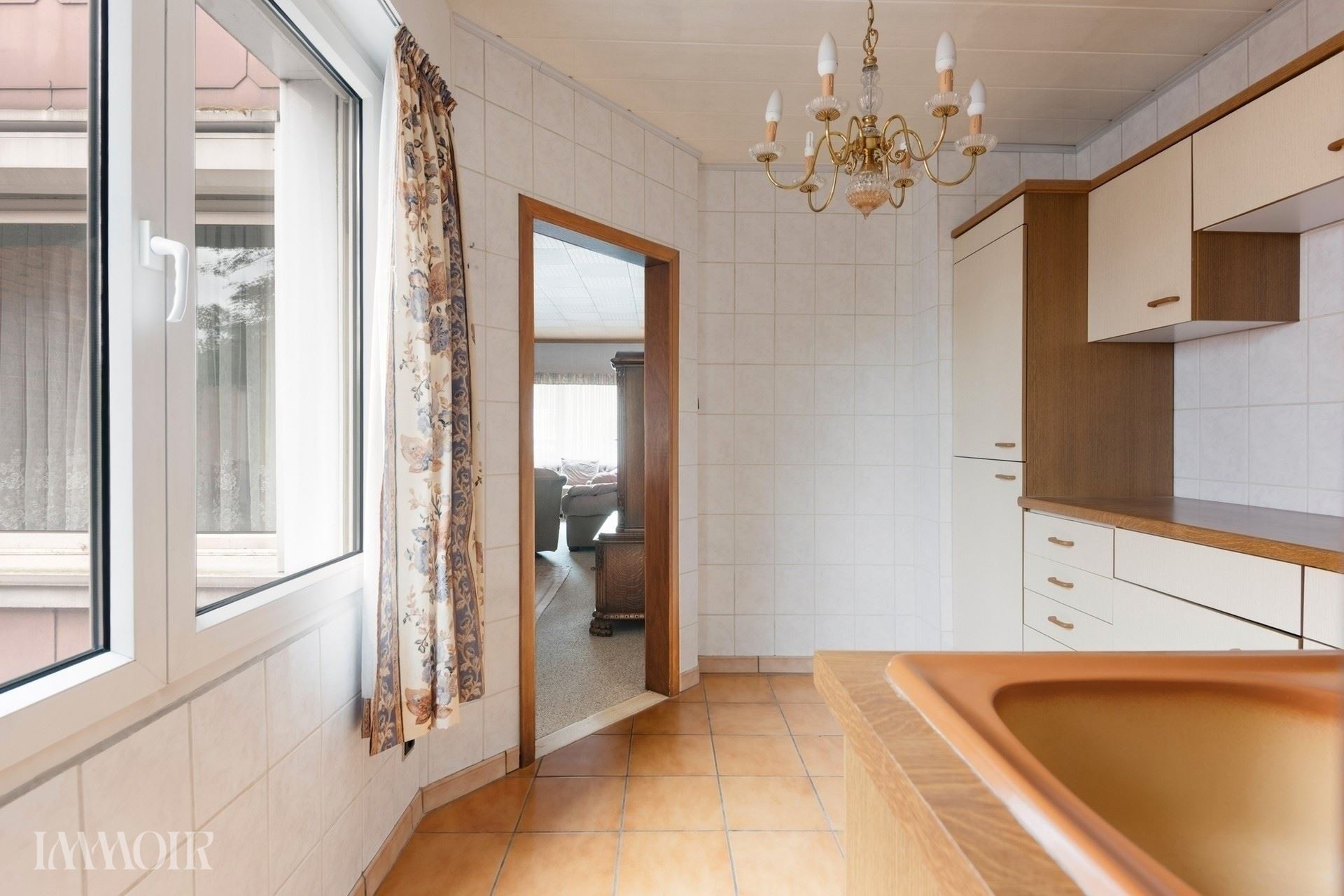Ruime woning met stadstuin en tal van mogelijkheden op centrale ligging.