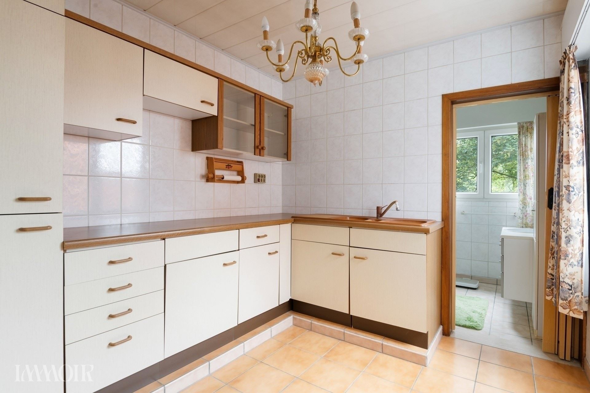 Ruime woning met stadstuin en tal van mogelijkheden op centrale ligging.