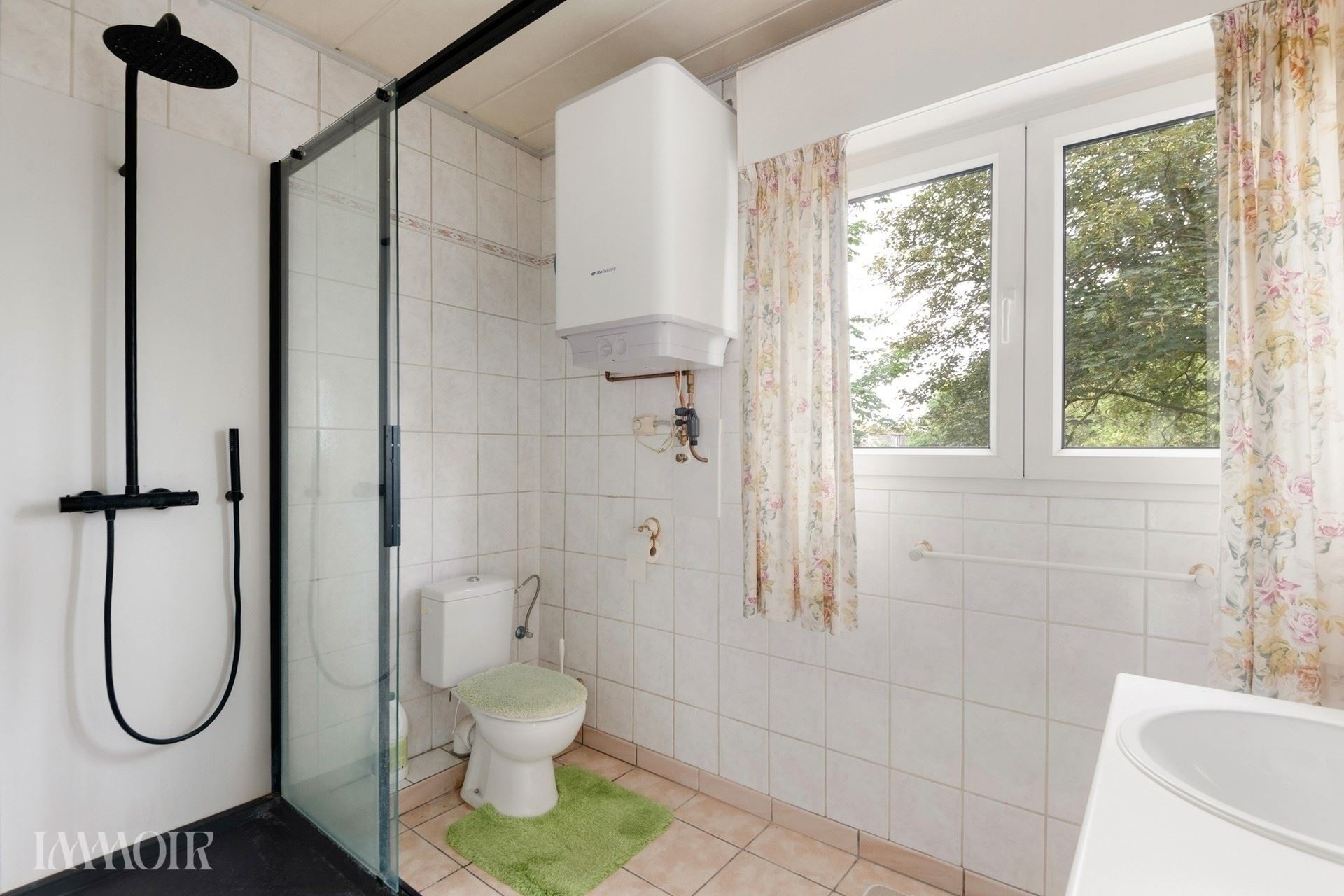 Ruime woning met stadstuin en tal van mogelijkheden op centrale ligging.