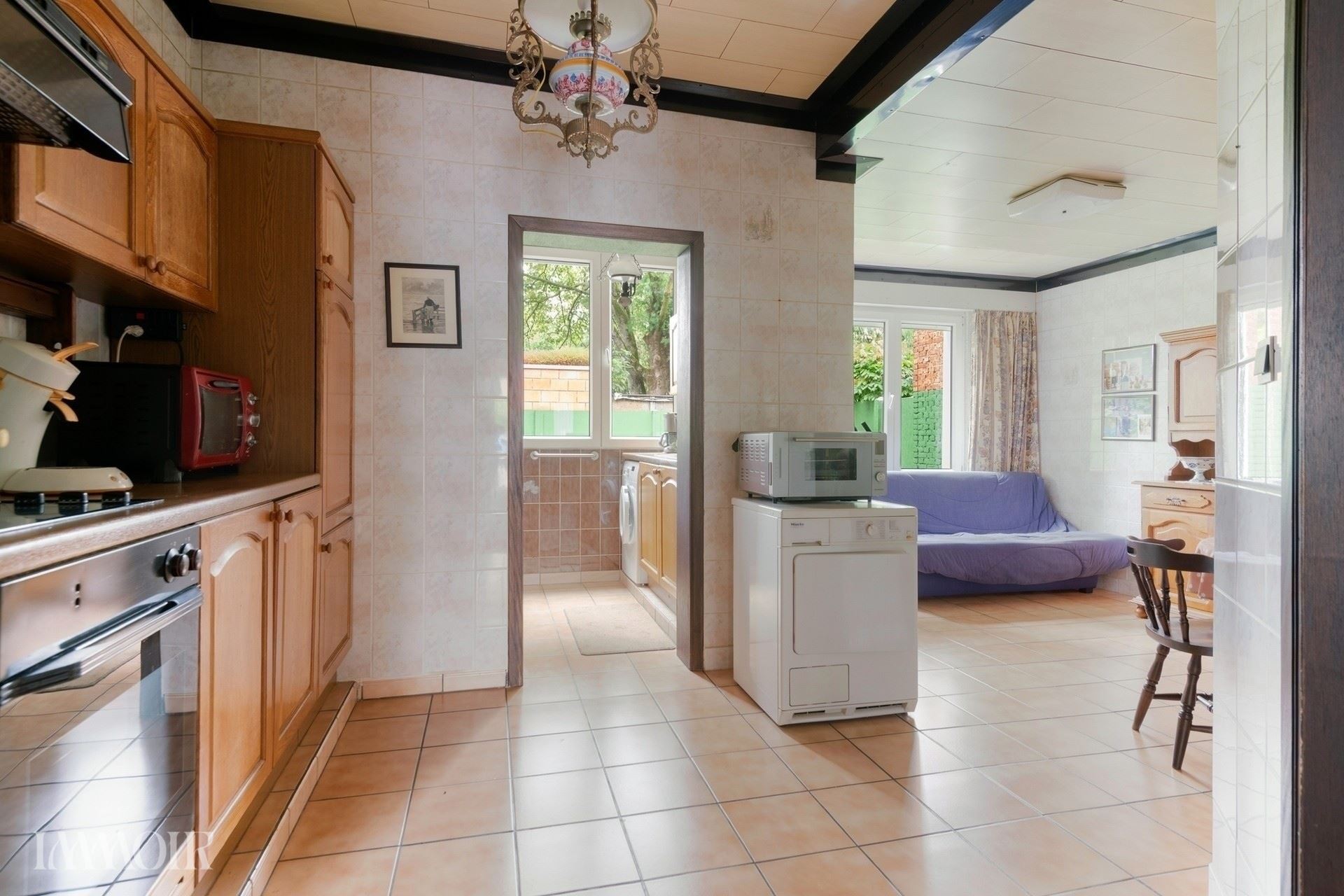 Ruime woning met stadstuin en tal van mogelijkheden op centrale ligging.