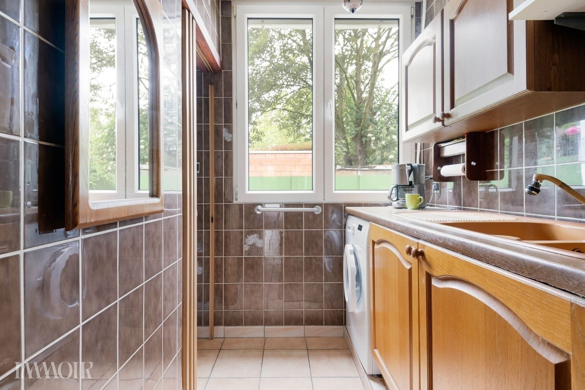 Ruime woning met stadstuin en tal van mogelijkheden op centrale ligging.
