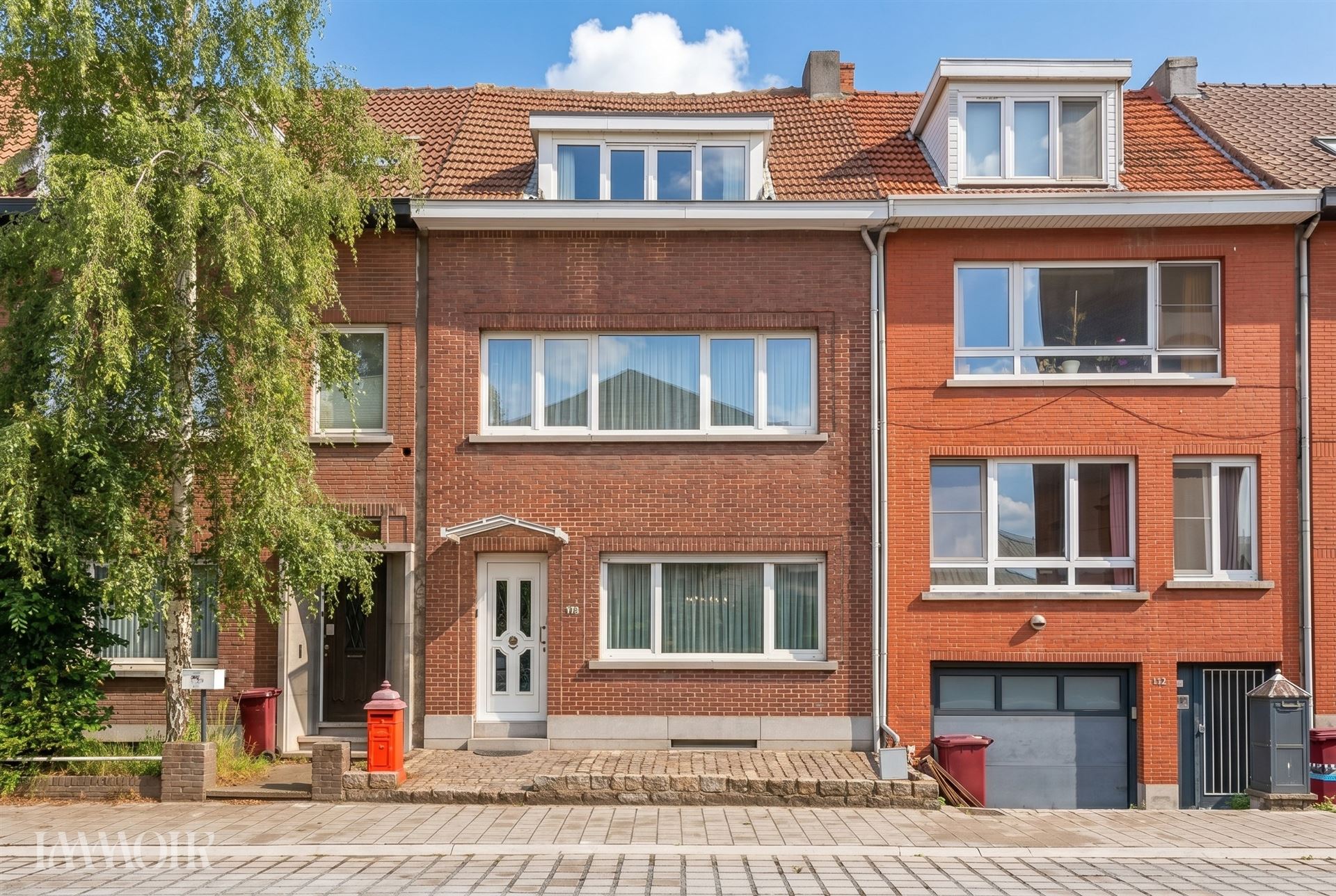 Ruime woning met stadstuin en tal van mogelijkheden op centrale ligging.