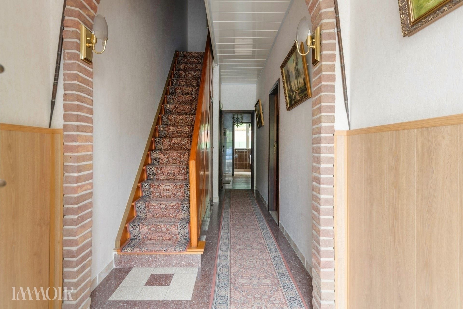Ruime woning met stadstuin en tal van mogelijkheden op centrale ligging.