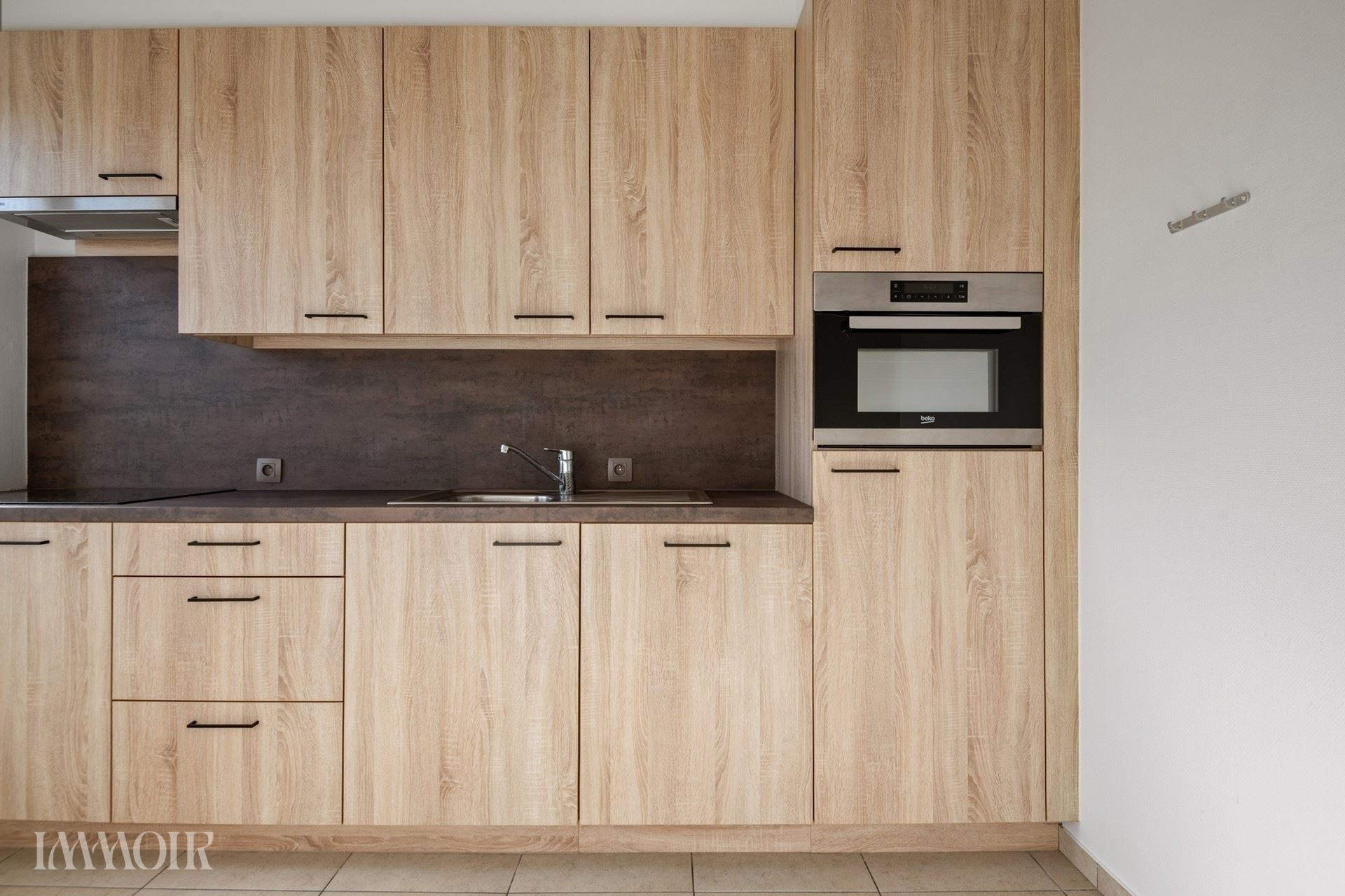 Centraal gelegen en instapklaar appartement met garagebox.