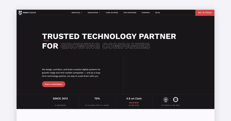 Mind Studios homepage, a technology partner since 2013 with a 4.9 Clutch rating building complex digital systems for growth-stage companies, featured in the custom software development companies guide