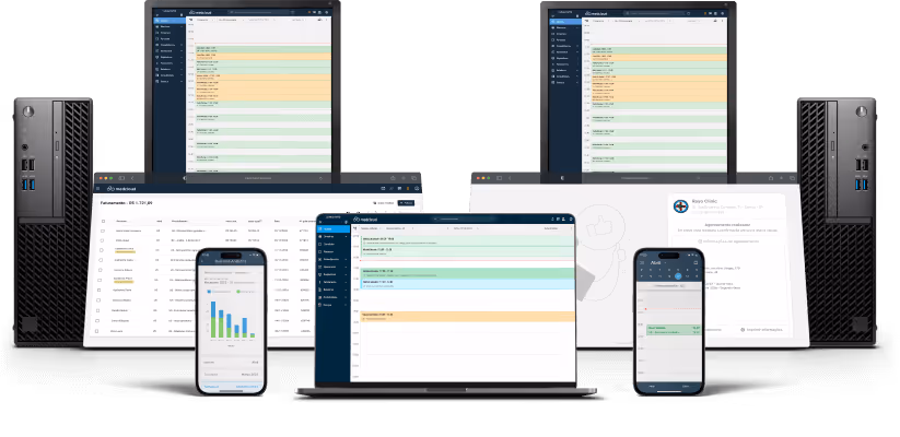 Dois computadores desktop, dois laptops e dois smartphones exibindo diferentes telas de um sistema de agendamento e faturamento de clínica médica.