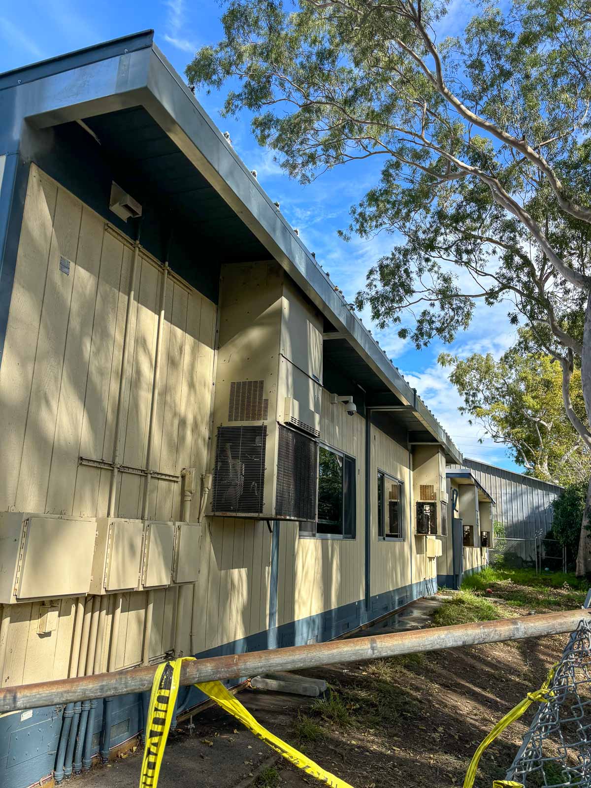 After: completed fascia repair along the modular classroom exterior