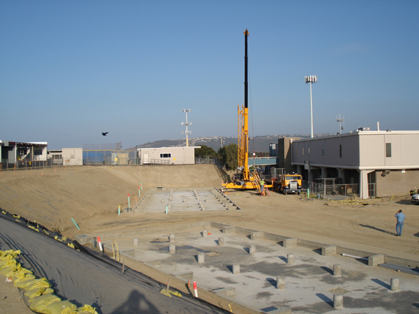 Crane staged over the foundation piers before the building set