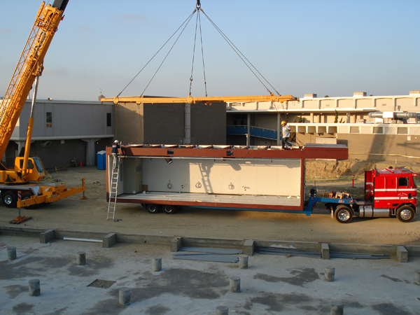 Modular unit on the truck rigged for the crane lift