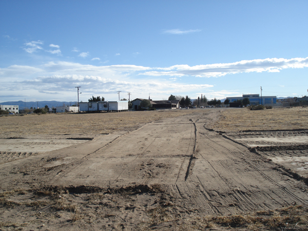 Graded dirt pad ready for the modular building set