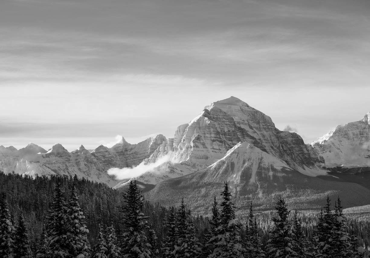 This image shows the highest mountain peak at Lake Louise in Banff, Alberta, Canada. The highest peak is called "Mt. Temple" and its elevation is 3,544 m (11,627 ft)