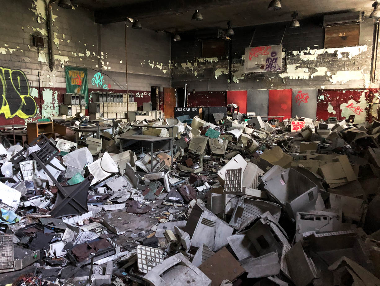 The gymnasium full of broken computers inside the abandoned Carver Elementary School in Gary, Indiana