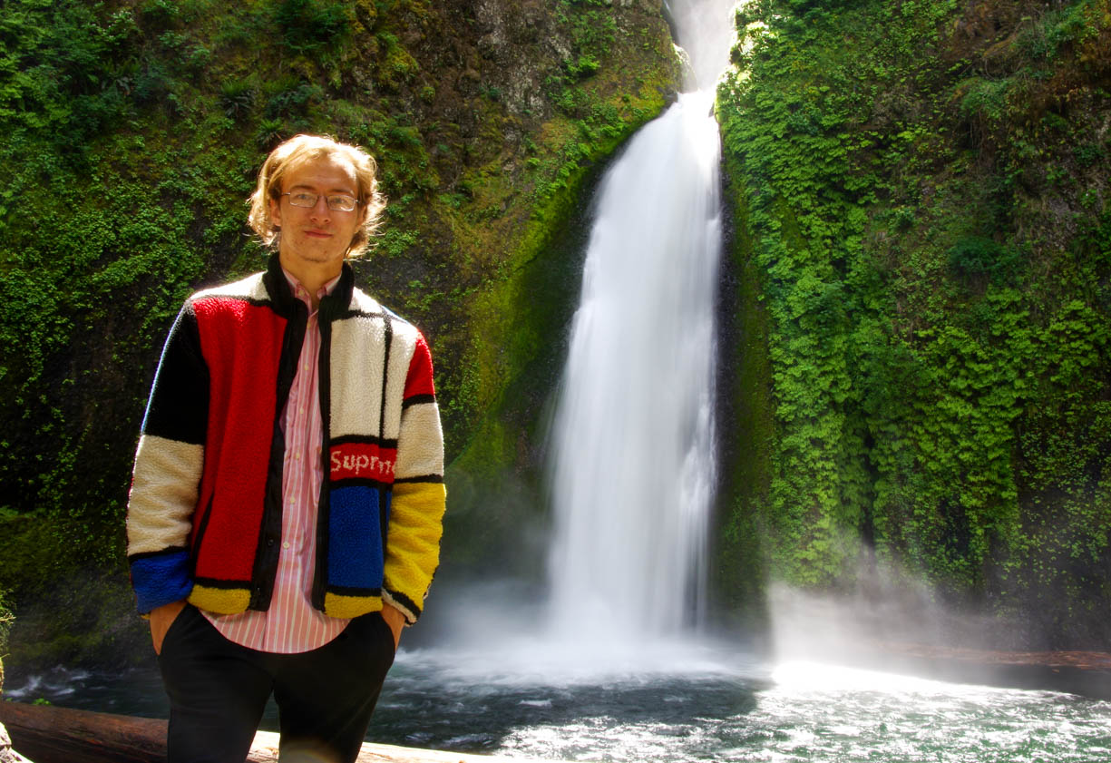 Myself in front of a waterfall in Hood River, Oregon