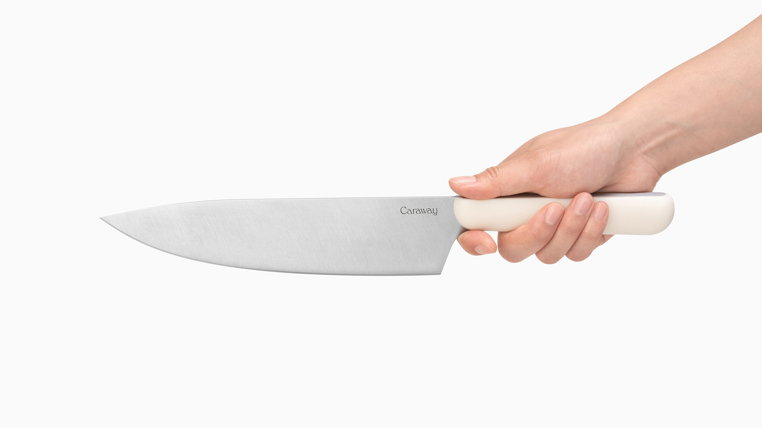 Caraway Chef's Knife in hand.