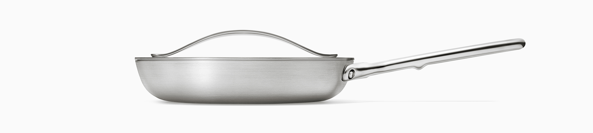 Side view of Caraway Stainless Cookware Frypan.