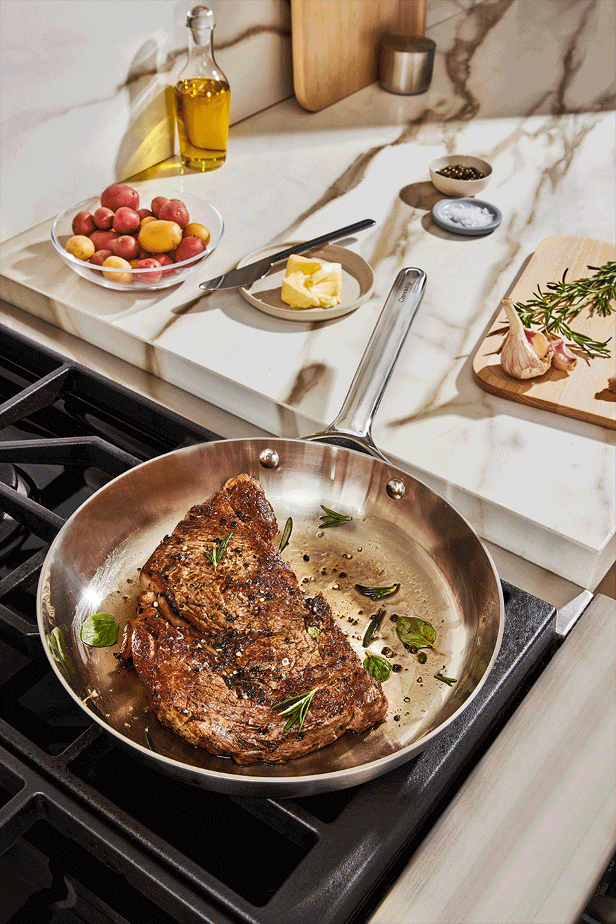 Caraway Stainless Cookware in use.