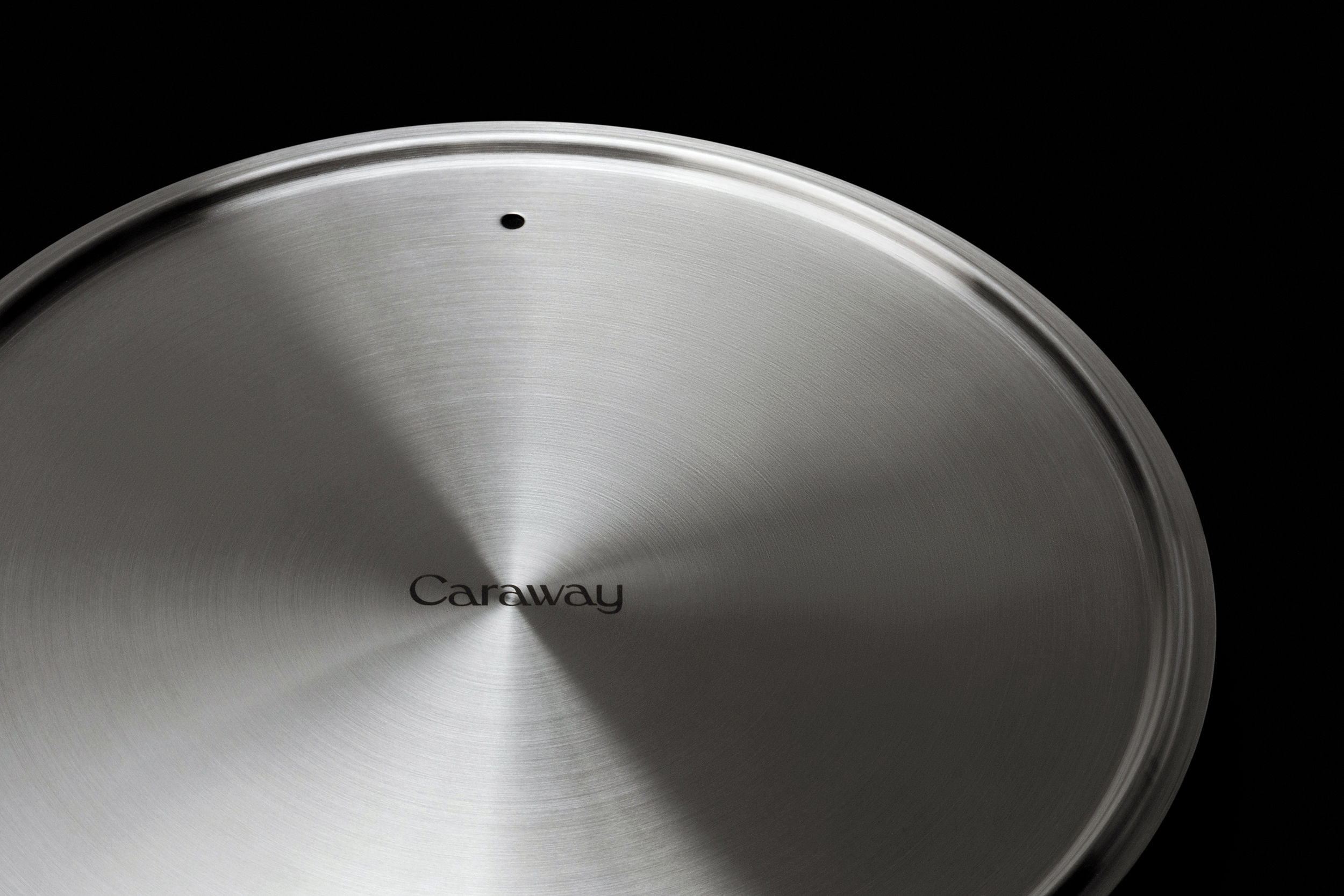 Caraway Stainless Cookware lid detail.