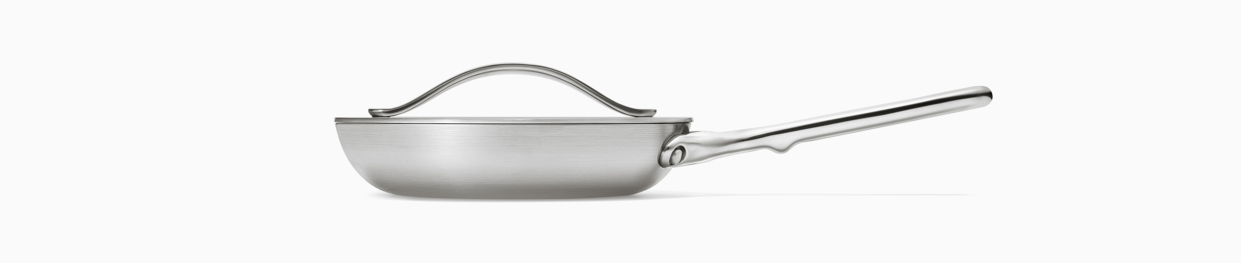 Side view of Caraway Stainless Cookware Mini Frypan.