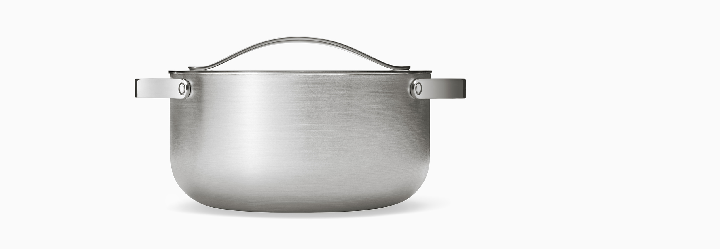 Side view of Caraway Stainless Cookware Dutch Oven.