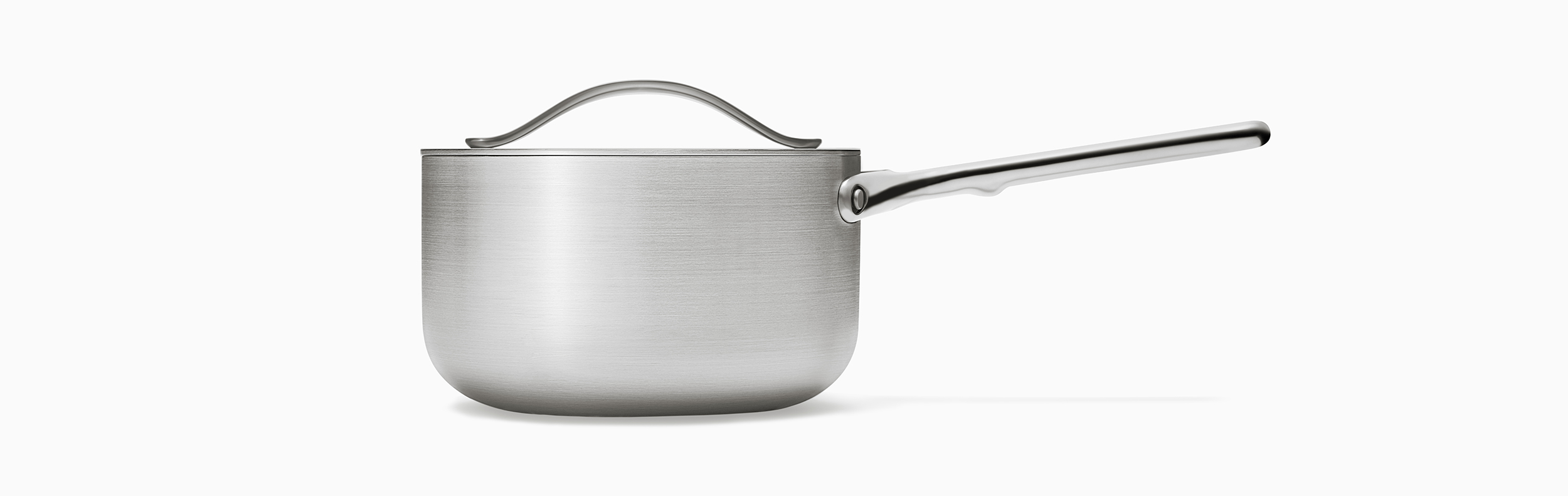 Side view of Caraway Stainless Cookware Sauce Pot.