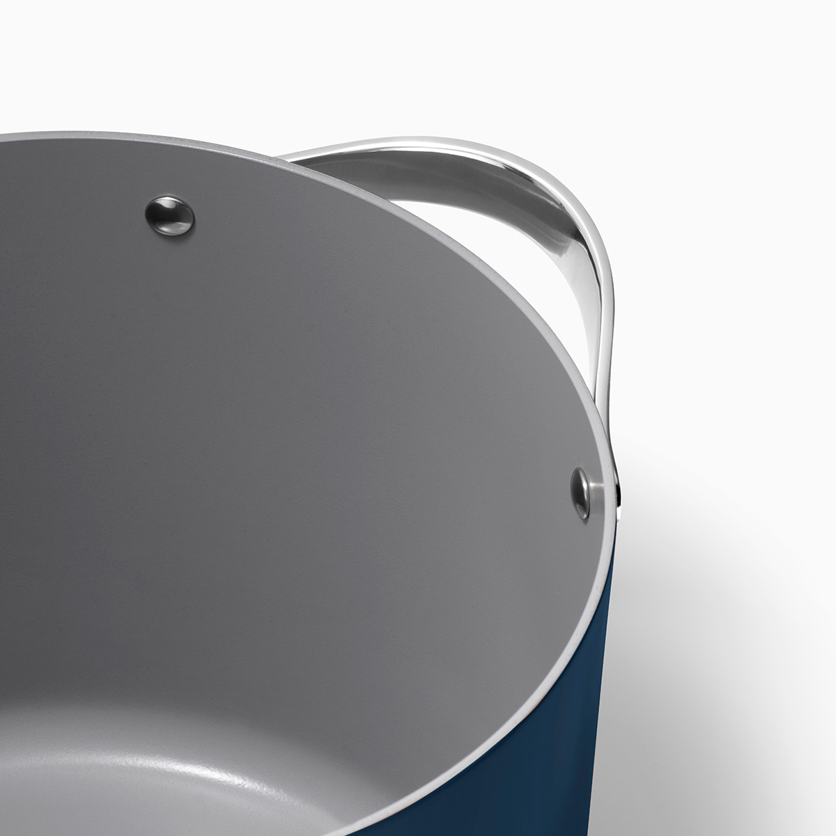 Side handle detail of Caraway Cookware Plus Stock Pot.