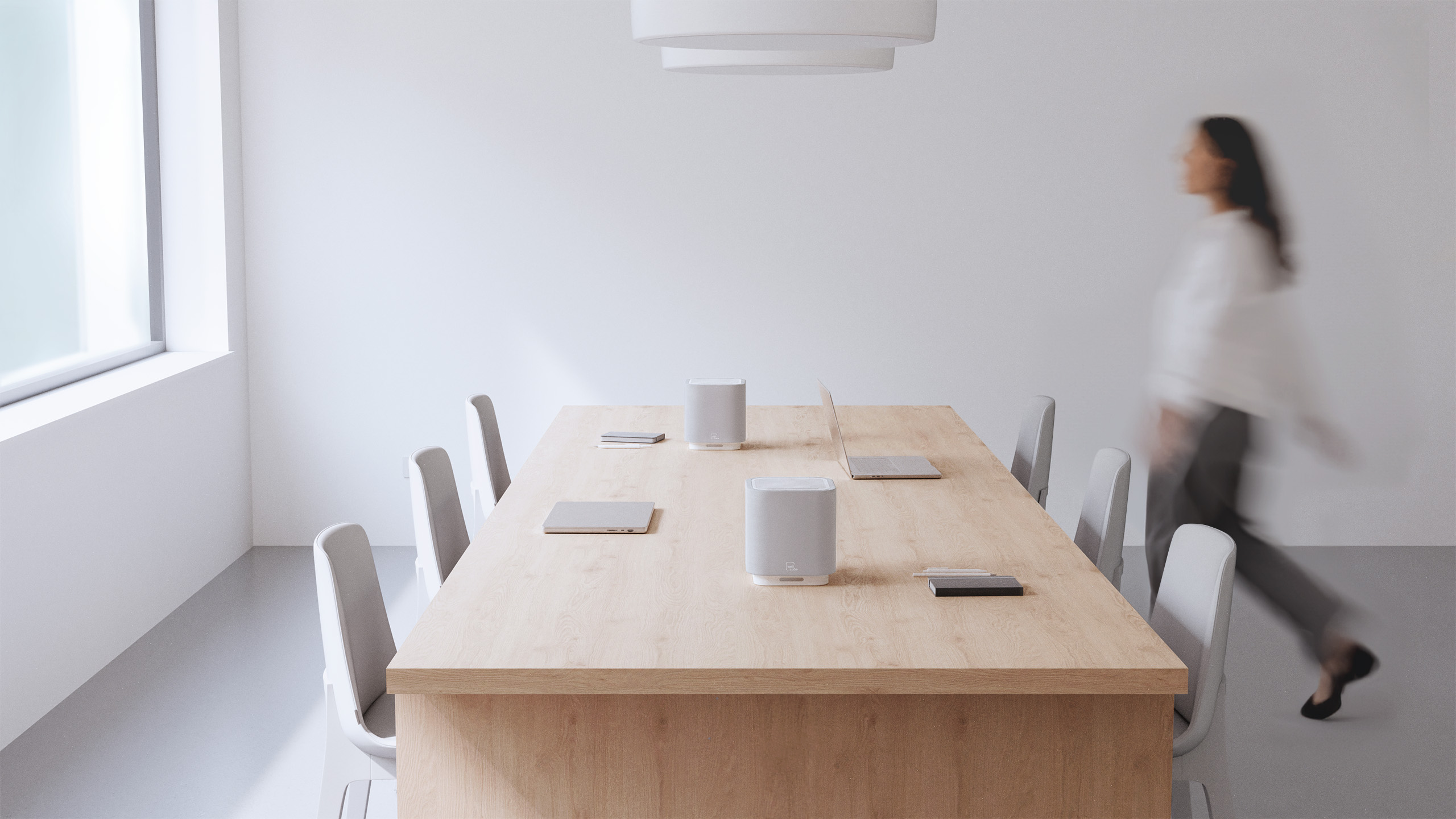 Delos WellCube on a desk in an office environment.