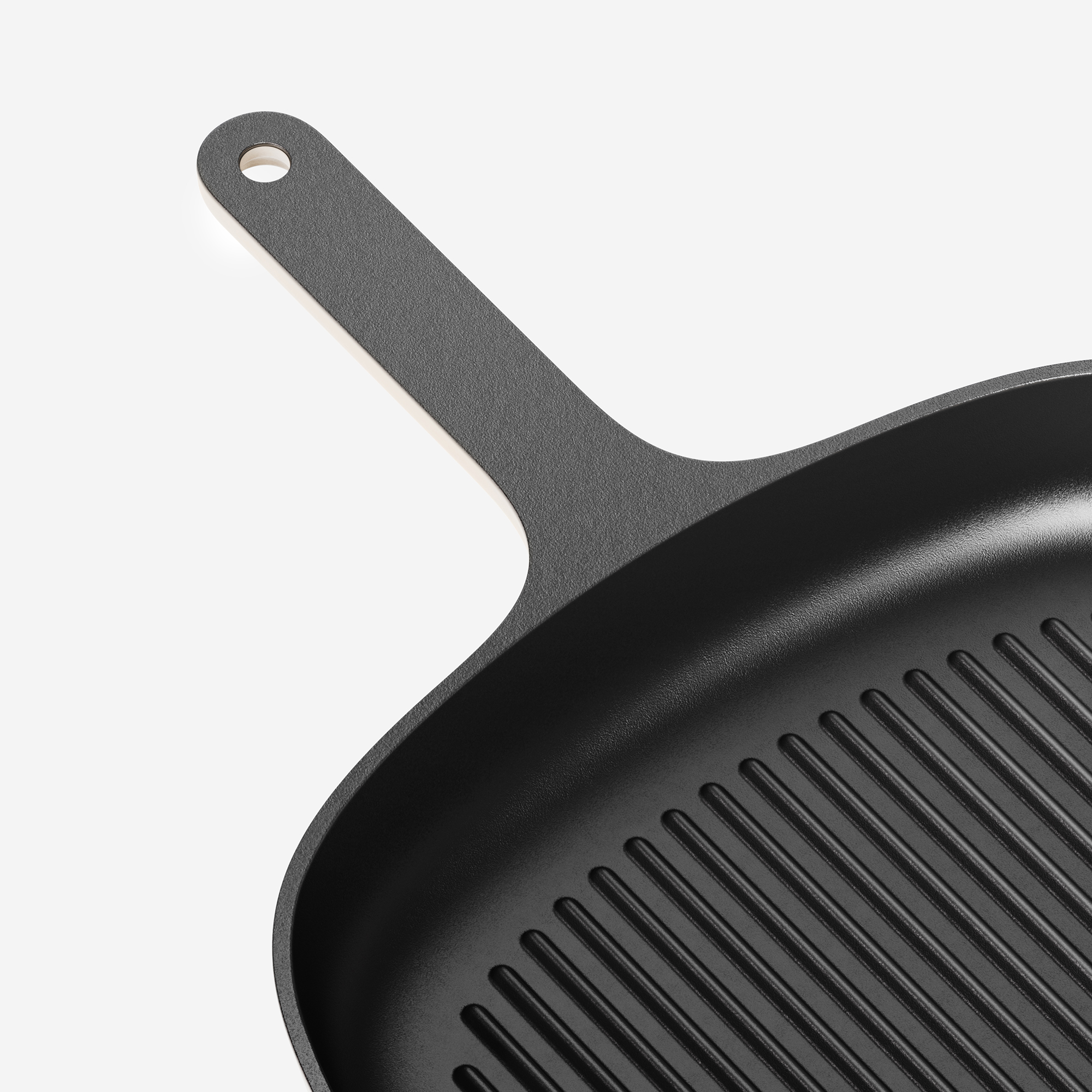 Handle detail of Caraway Cast Iron Grill.