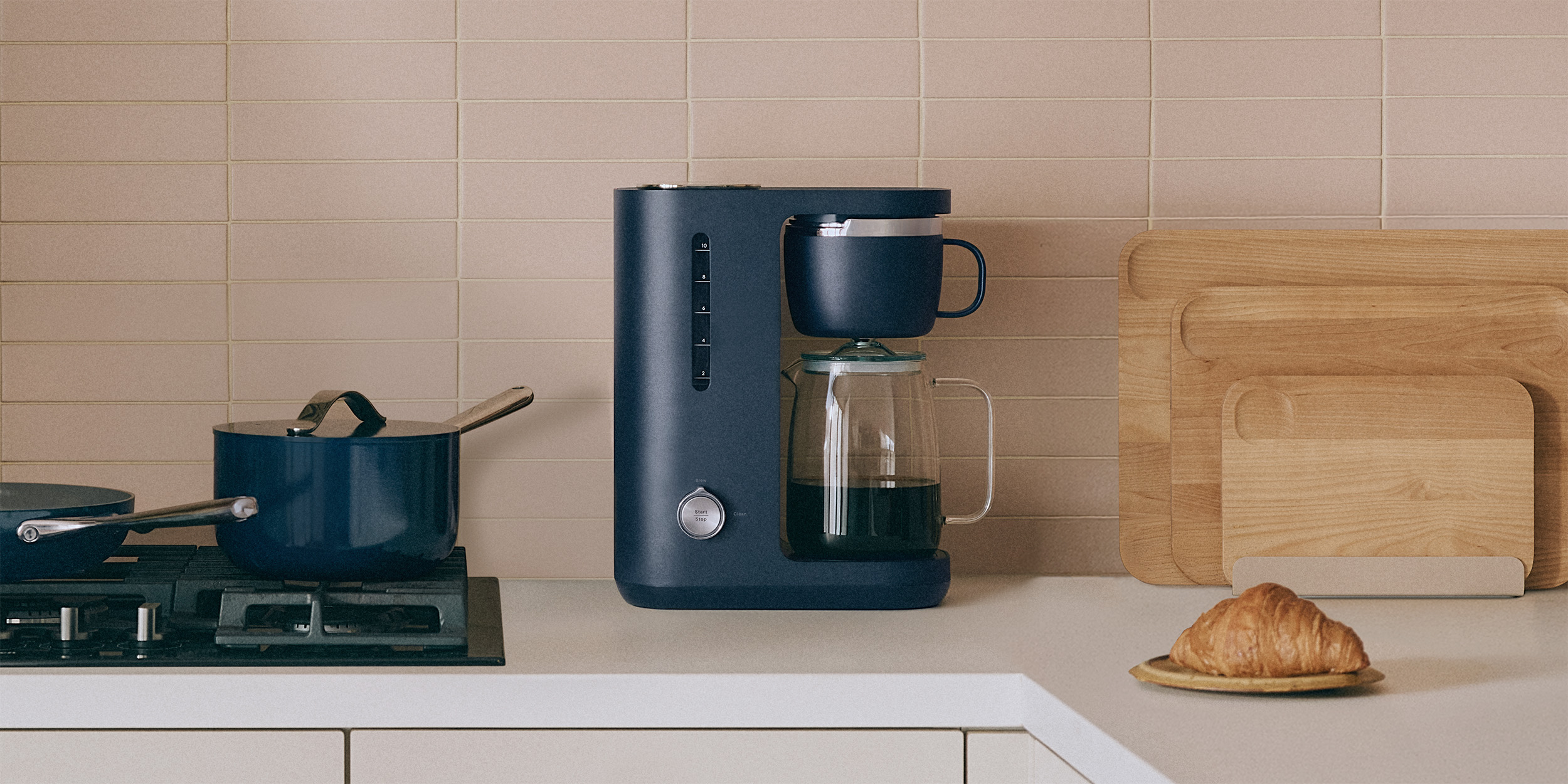 Caraway Coffee Maker on kitchen counter.