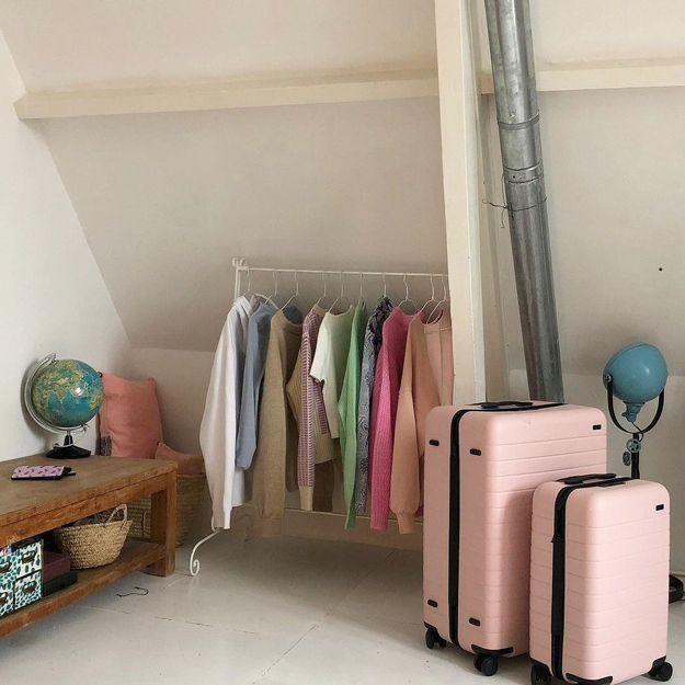 Away Luggage social media post - luggage next to a closet