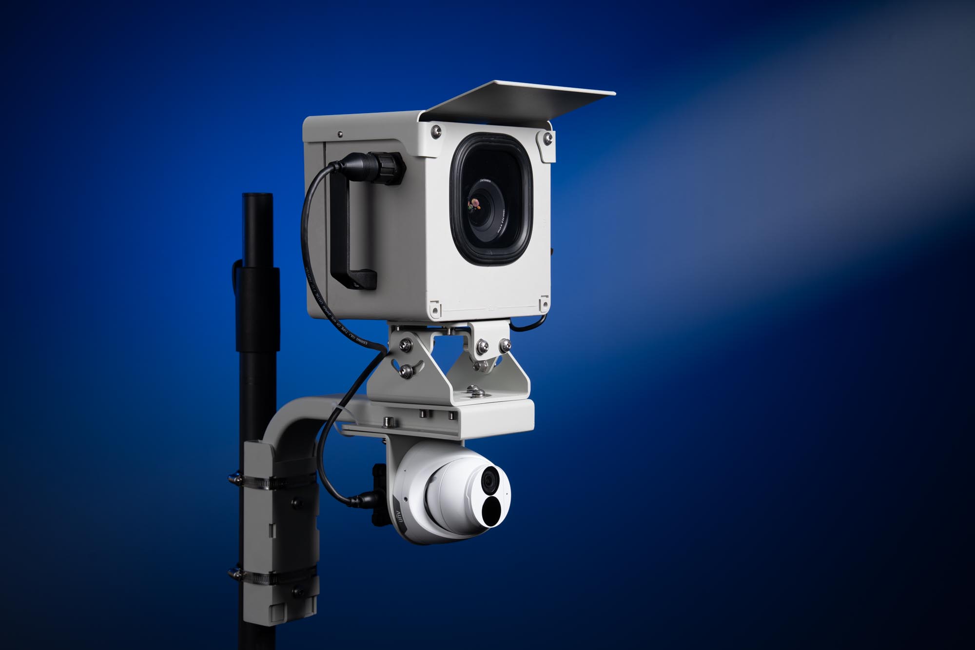 Complete BuildCam dual camera system showing AC power adapter for continuous construction documentation