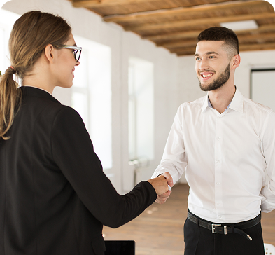 Two people shaking hands on a positive outcome