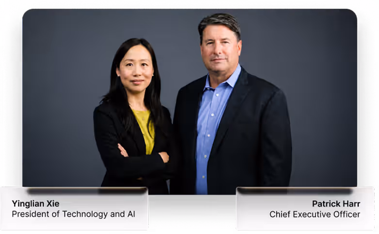 Portrait of Yinglian Xie and Patrick Harr, executives posing against a dark gray background.