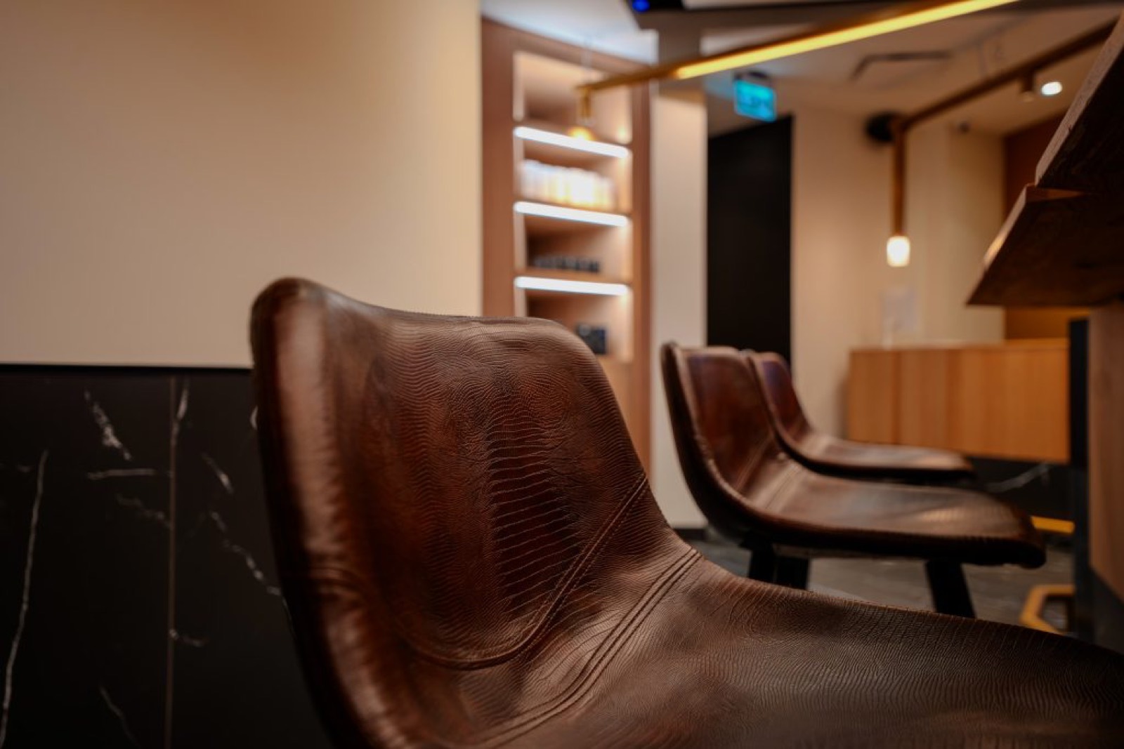 Le lounge Gallantier, fauteuils de cuir cognac